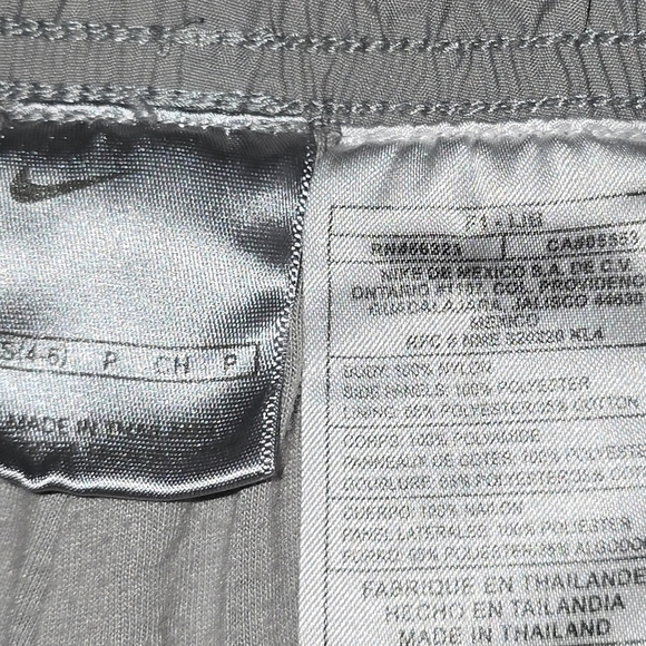 Nike Wind Breaker Pants Women Sz 4-6 Gray Hem Side Zippers Athleisure - Picture 15 of 15